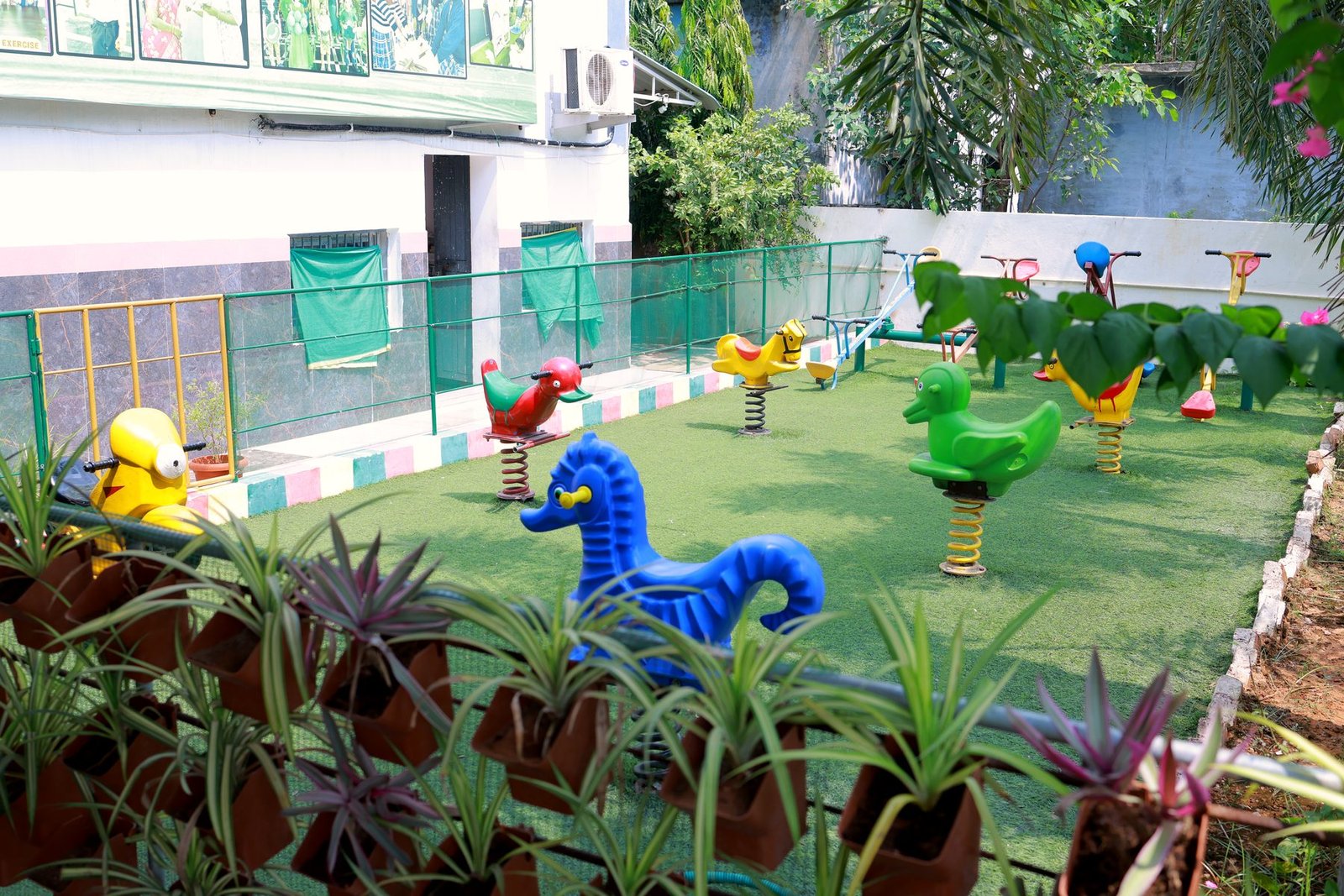 Play park with ride-on animals
